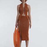 Kick up skirt in tobacco with button side detail.