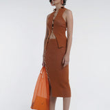 Kick up skirt in tobacco with button side detail.