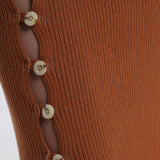 Kick up skirt in tobacco with button side detail.