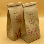 masha tea in variation "skin tea" and "love tea" depicted in packaging 