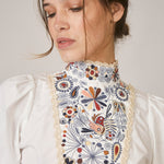 floral white blouse worn by model 