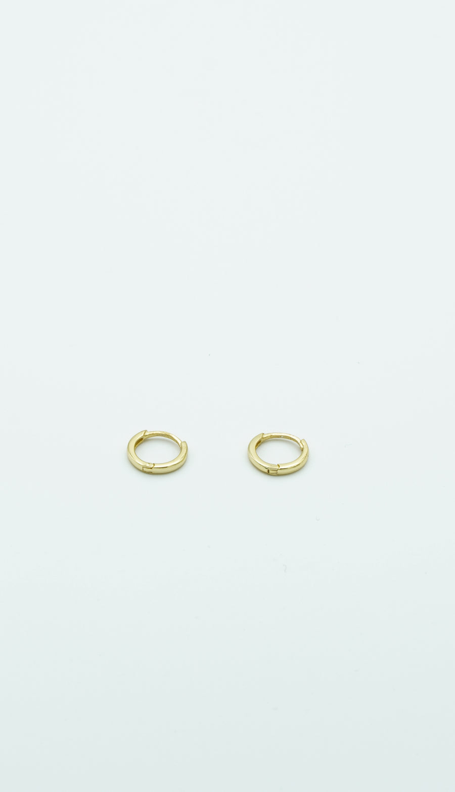 gold huggies depicted 