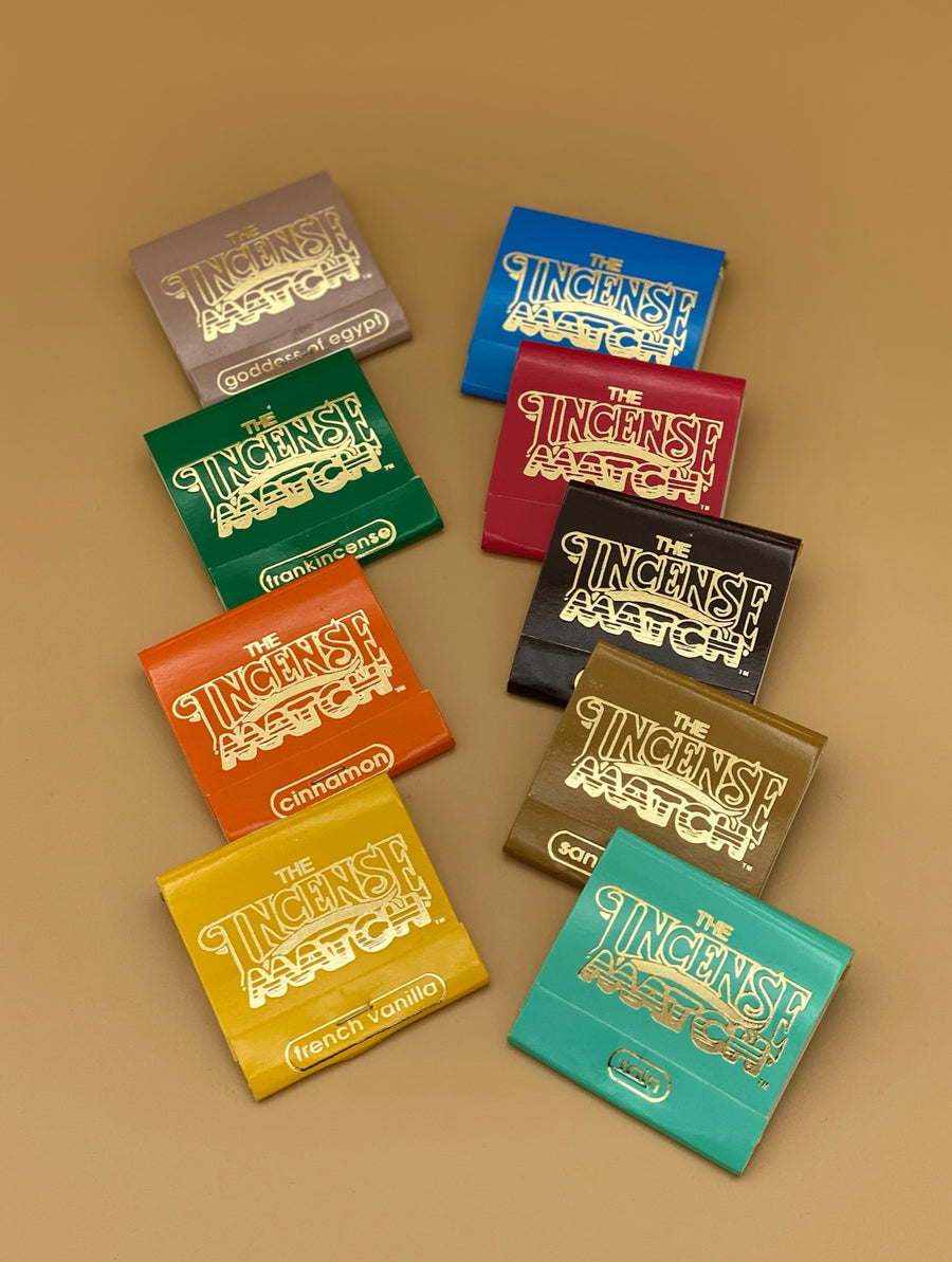 incense matches in different colors and scents depicted in their case