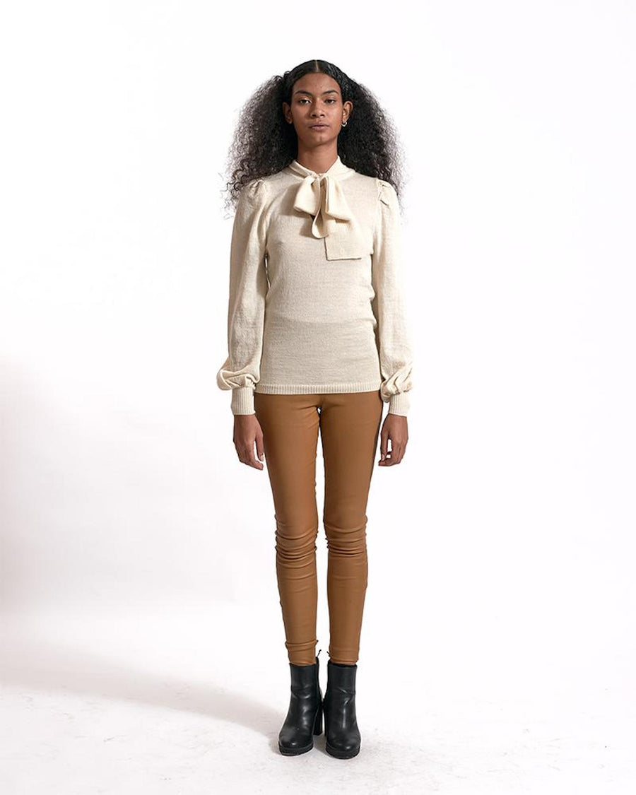 ivory blouse worn by model front standing pic 