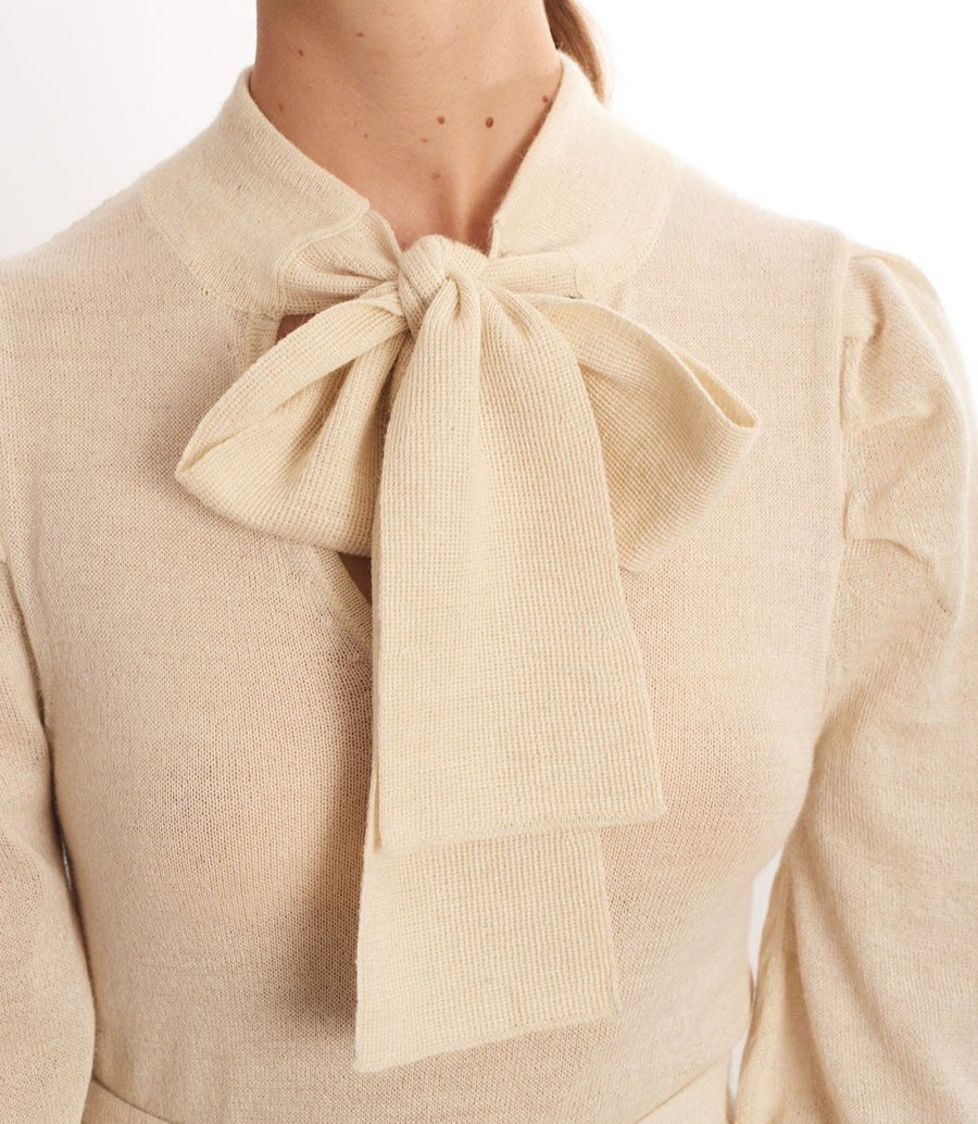 model wearing white ivory blouse 